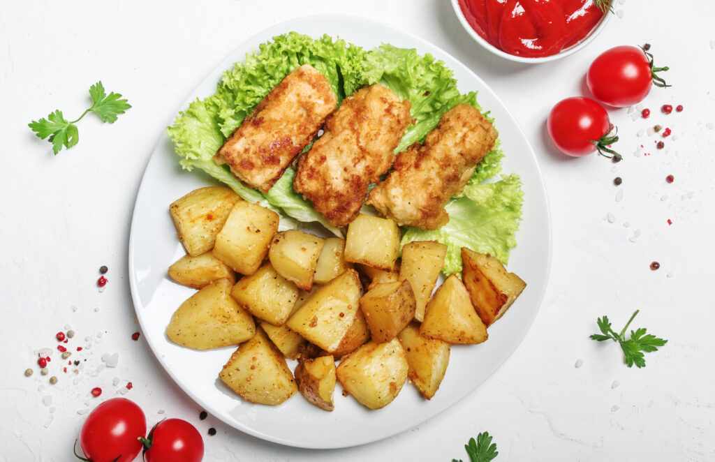 Fish and chips with tomato sauce